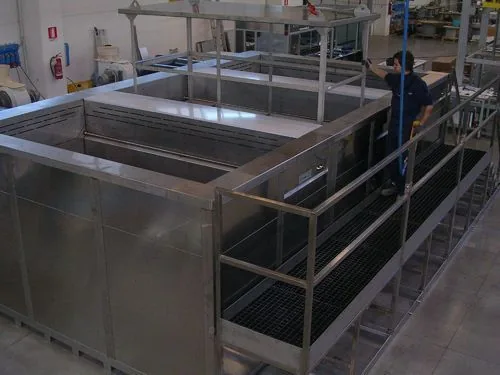 Zinc phosphating plant with stainless steel process tanks and walkway